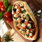 Pizza mit Feta und Spinat, Foto Wirths PR