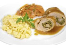 Mit Kerbel-Pesto gefüllte Roulade vom Landschwein, dazu Honig-Petersilien-Karotten und Knöpfle, Foto Deutsche Bahn, WH 2/10